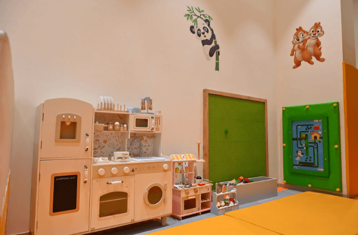 Kids exploring indoor soft play area at Snuggle & Play